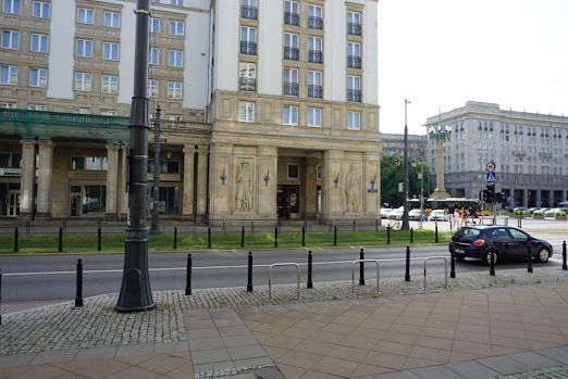 The working people are chiselled into the facades during communism in Warsaw