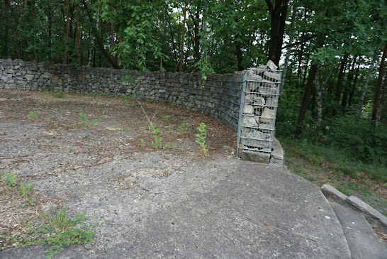 Tombstones from unknown graves collected in steel cages