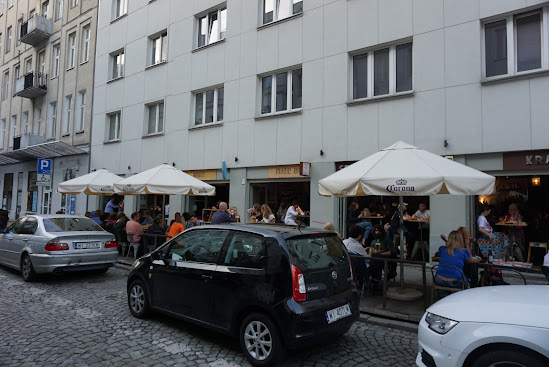 Poznanska Street is a place where locals go for a drink and something to eat